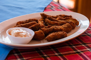 Fish Finger batter fry served with dipping sauce, Indian seafood starters 