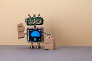 Robotics logistics and delivery service. Robot courier with parcels packed in cardboard boxes. copy...