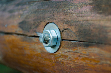 Wood bolted connection, with a nut and washer