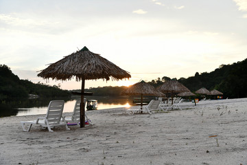 sandy beach at dawn on one of the tributaries of the Amazon in Brazil