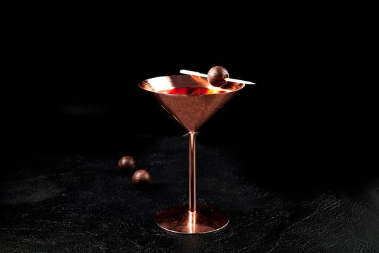 cocktail on a black background, assorted cocktails, minimalism in cocktails
