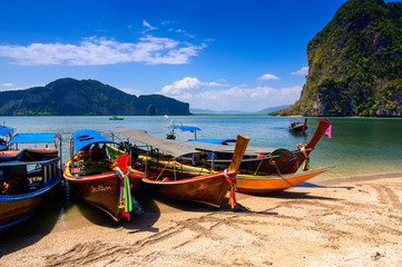 Long boat on the white sand beach in Phang Nga Tapu Island, Thailand Is a popular destination that is famous for beaches