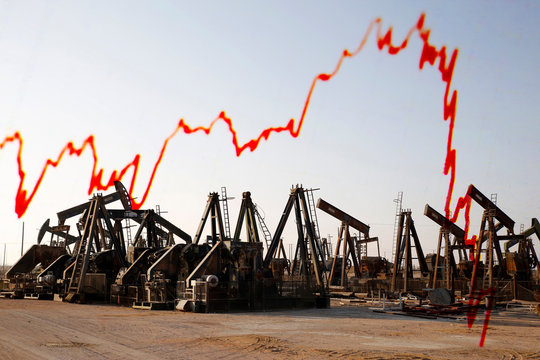 Old oil pump jacks at a scrap yard, Oman - Powered by Adobe