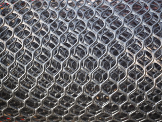 plastic mesh or black hexagonal extruded plastic netting texture using for garden planting or fencing and plant protection concept.