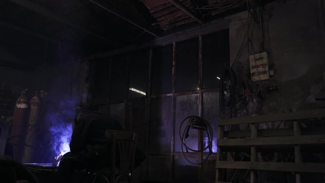 arc welder man late night work