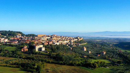 Fototapeta na wymiar Aerial view of a magnificent landscape of the Italian village Chianciano, authentic village of Terme, Tuscany Italy 