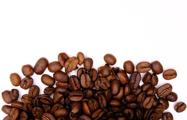 Roasted coffee beans on white background