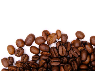 Roasted coffee beans on white background