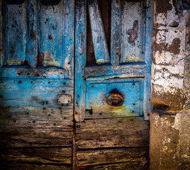 Old colored wooden door closeup.