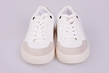  Fashionable white thick sole leather Sneakers on laces isolated on white background