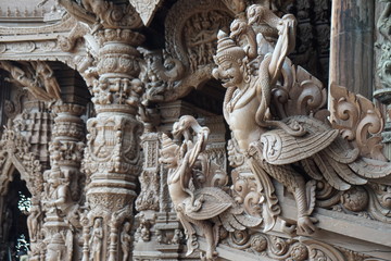 Fototapeta na wymiar Garuda wood carving art in sanctuary of Truth (or Prasat Sajja Tham), it's all wood building filled with traditional sculptures at Pattaya, Thailand