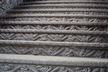Antique carved staircase in Thailand