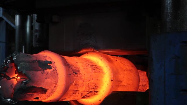 Forging a hot workpiece on the press. Press-Forging Shop