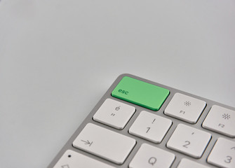 Part of a keyboard with green esc button