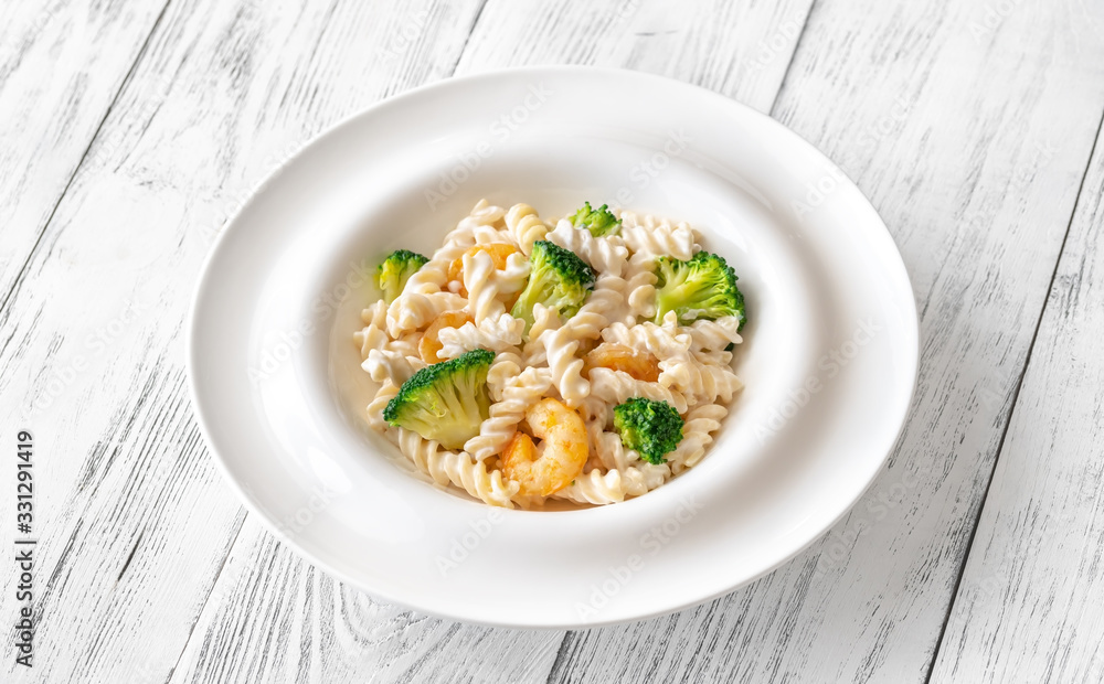 Wall mural fusilli with broccoli and shrimps