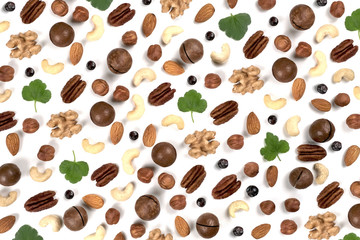 A pattern of nuts on a white background