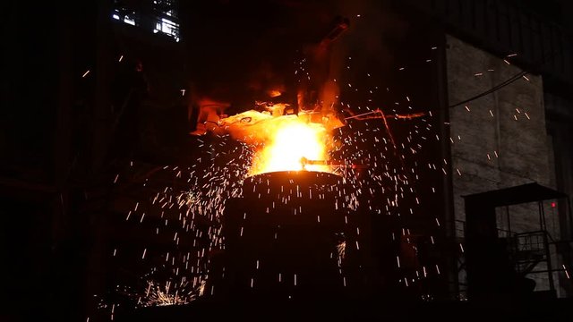 Steel melting at a metallurgical plant. Ingot casting