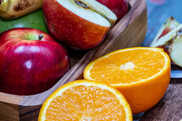 red and green apples oranges and tasty tangerines along with other fruits