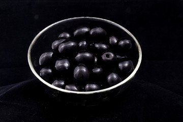 black olives in a glass bowl