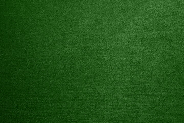 Fototapeta premium Green metallic textured background with a gradient.