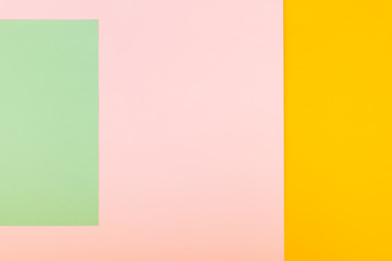 Fototapeta premium Geometric Colorful Paper Background.Different colored papers,bright abstract background.Trend colors, geometric paper background. Colorful of soft three colors background.