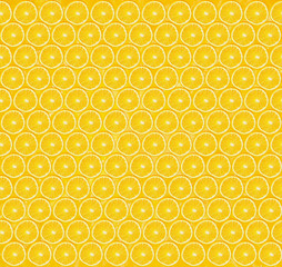Texture of sliced orange slices on yellow background. Healthy lifestyle