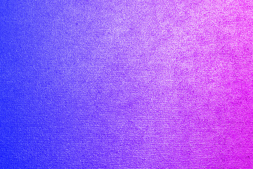 Multi-colored metal textured background with a gradient.