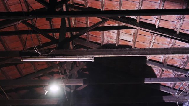 reflections of arc welding light into the night