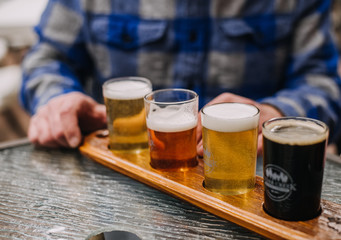 glass of beer on table in restaurant
