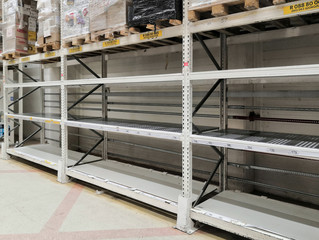 Empty shelves in the grocery department "Household goods" supermarket