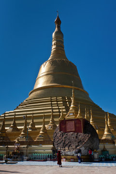 Shwemawdaw Pagoda with Old Hti, a portion of the fallen pre-1917 version of the Paya. Bago, Myanmar