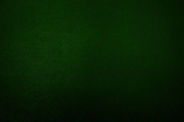 Green metallic textured background with a gradient.