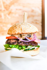 powerful burgers with juicy cutlets, fresh vegetables and crispy buns.
