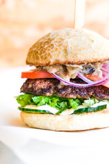powerful burgers with juicy cutlets, fresh vegetables and crispy buns.