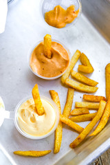 crispy, juicy snacks with delicious sauce. wings, fries, potato wedges, nuggets