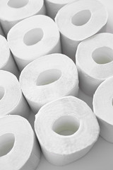 Toilet paper on a white background, essential goods. Texture.