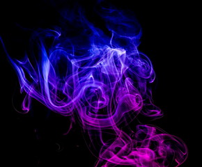 Colored smoke on black background