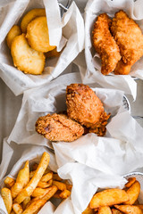 crispy, juicy snacks with delicious sauce. wings, fries, potato wedges, nuggets