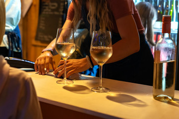 summer festival event with light and two glasses of white wine wine festival selling wine