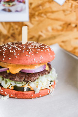 powerful burgers with juicy cutlets, fresh vegetables and crispy buns.