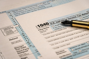 Obraz premium Filling the Tax Form. Standard US Income Tax Return