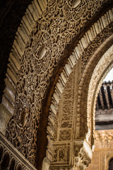 Arch with Arabic pattern in La Alhambra, Granada, Spain