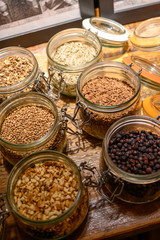 Tastes of gin, botanicals ingredients for gin distillery process, dried orange peels, juniper...
