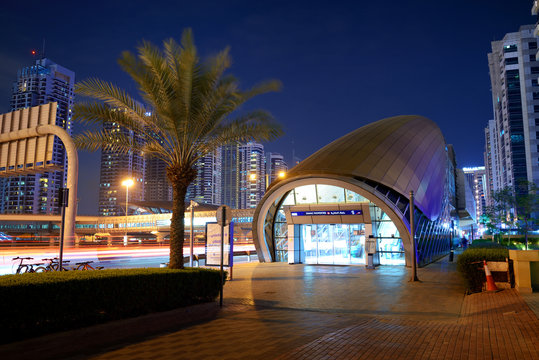 DUBAI, UAE - NOVEMBER 15: The night illumination of Damac Properties metro station on November 15, 2019 in Dubai, UAE