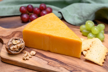 Cheese collection, yellow matured cheddar cheese triangle piece from England
