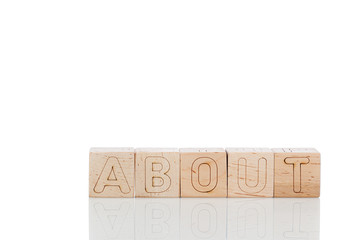 Wooden cubes with letters about on a white background
