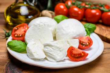 Cheese collection, white italian mozzarella cheese balls for salad or for appetizer snacks from deli shop in New York, USA