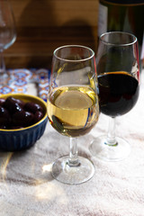 Fortified wine from Andalusia, Spain, different types of sherry in glasses and olives, colors of Andalusisa