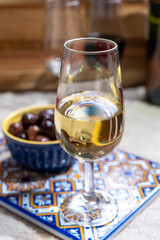 Fortified wine from Andalusia, Spain, different types of sherry in glasses and olives, colors of Andalusisa