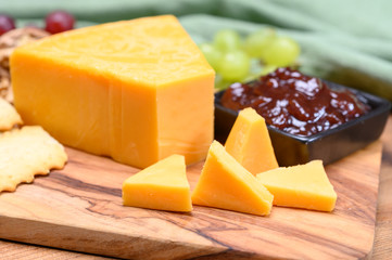 Cheese collection, yellow matured cheddar cheese triangle piece from England